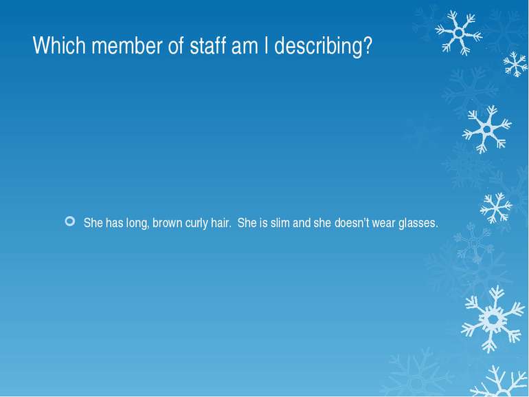 Which member of staff am I describing? She has long, brown curly hair. She is...