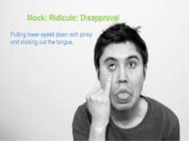 Mock; Ridicule; Disapproval Pulling lower eyelid down with pinky and sticking...