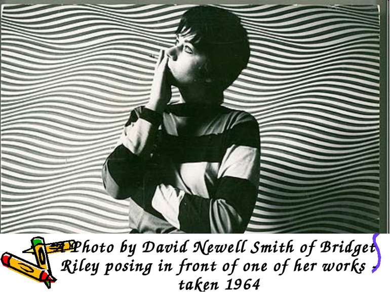 A Photo by David Newell Smith of Bridget Riley posing in front of one of her ...