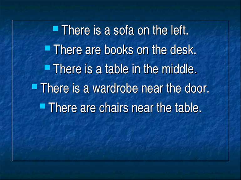 There is a sofa on the left. There are books on the desk. There is a table in...