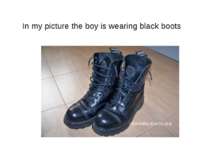 In my picture the boy is wearing black boots