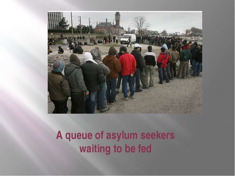 A queue of asylum seekers waiting to be fed 
